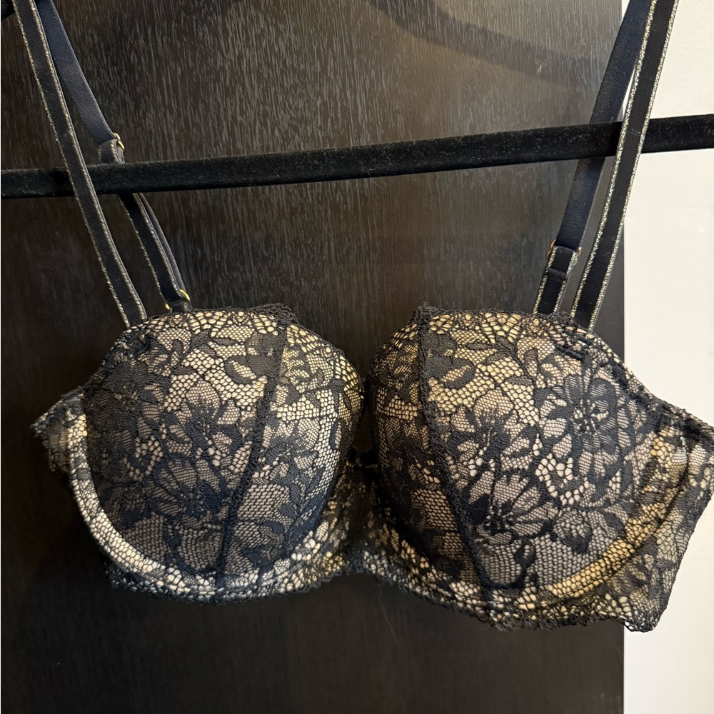 B. Tempt'D bra black lace with gold accents Sz: 34 C